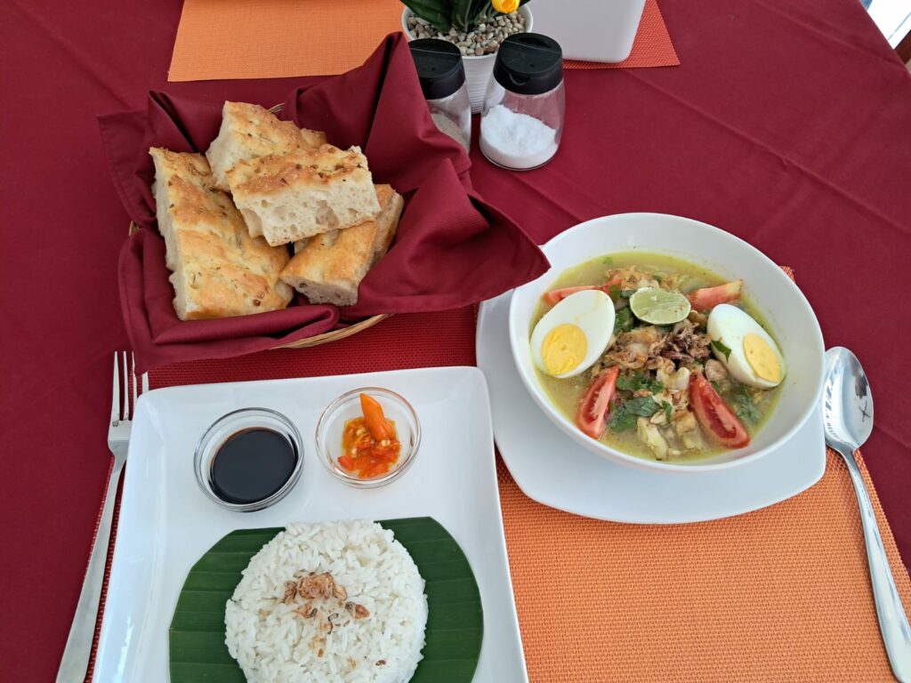 Dish set of a balinese breakfast. Bubur ayam